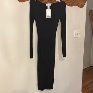 Elegant Black Ribbed Knit Dress low cut neck